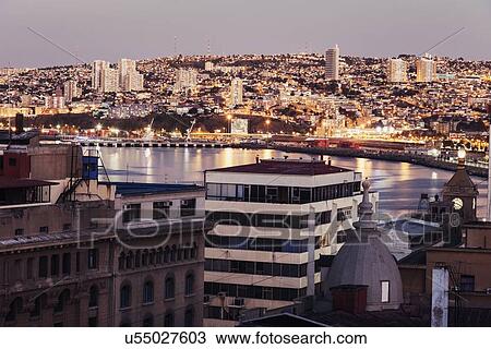 Stock Image - Cityscape at sunset. Fotosearch
