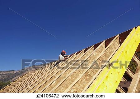 Construction worker working on construction site View Large Photo Image Stock Image - Construction worker working on construction site. Fotosearch