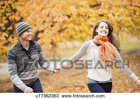 Stock Image - Couple in Central Park. Fotosearch