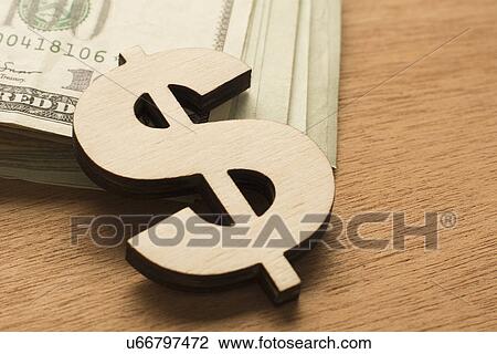 Stock Image - Dollar sign and cash. Fotosearch