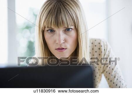 Female designer working on computer View Large Photo Image Stock Photograph - Female designer working on computer. Fotosearch