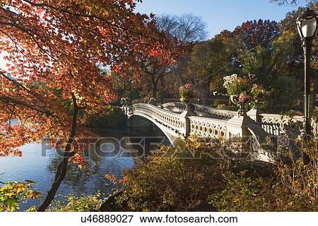 Stock Photo - Footbridge over lake in Central Park. Fotosearch