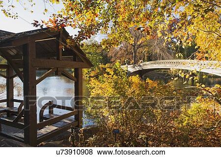 Footbridge over lake in Central Park View Large Photo Image Stock Photo - Footbridge over lake in Central Park. Fotosearch