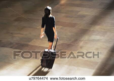 High angle view of woman walking at Grand Central Station View Large Photo Image Picture - High angle view of woman walking at Grand Central Station. Fotosearch