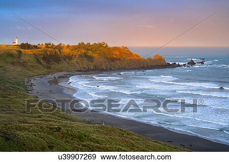 Stock Photo - Landscape with lighthouse in distance. Fotosearch