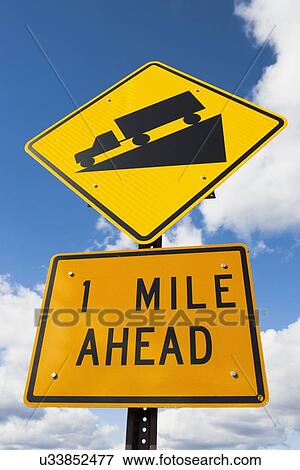 Stock Photo - Low angle view of road sign. Fotosearch