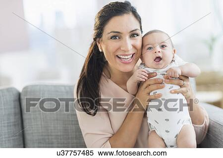 Mother holding baby boy (2-5 months) View Large Photo Image Stock Photography - Mother holding baby boy (2-5 months) . Fotosearch