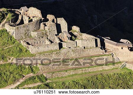 Stock Image - Overlooking ruins at sunset. Fotosearch