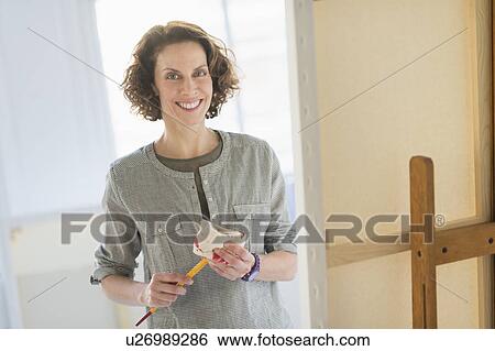 Portrait of artist in studio View Large Photo Image Stock Photograph - Portrait of artist in studio. Fotosearch
