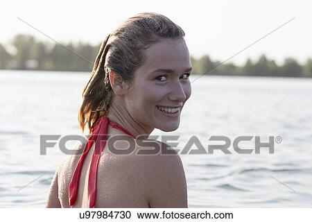 Portrait of beautiful woman in bikini View Large Photo Image Stock Image - Portrait of beautiful woman in bikini. Fotosearch