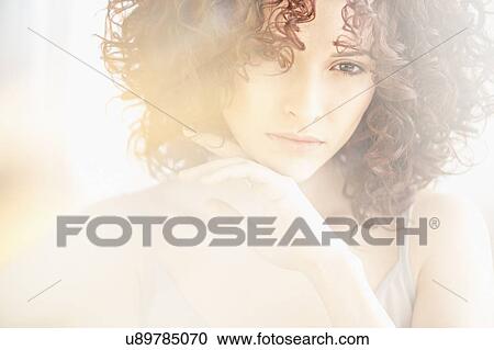 Stock Image - Portrait of beautiful woman. Fotosearch