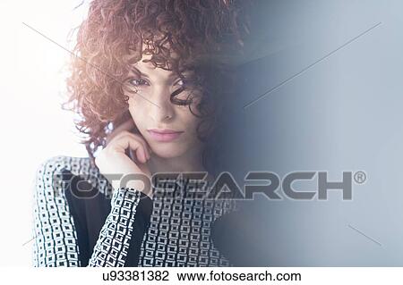 Stock Image - Portrait of beautiful woman. Fotosearch