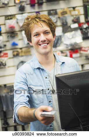 Portrait of bike shop assistant View Large Photo Image Picture - Portrait of bike shop assistant. Fotosearch