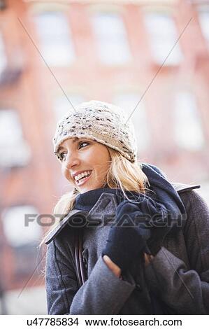 Portrait of blond woman wearing knit hat View Large Photo Image Picture - Portrait of blond woman wearing knit hat. Fotosearch