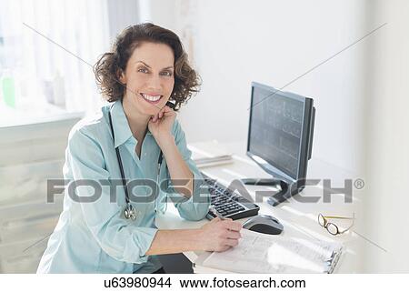 Picture - Portrait of female doctor. Fotosearch