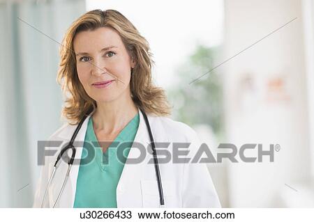 Portrait of female doctor View Large Photo Image Stock Image - Portrait of female doctor. Fotosearch