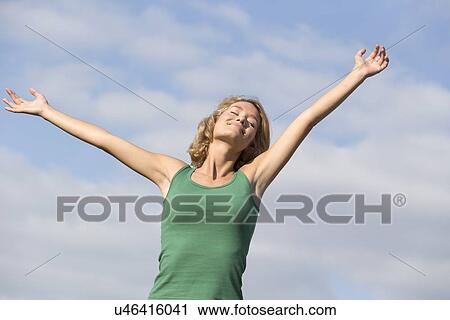 Stock Image - Portrait of happy woman. Fotosearch