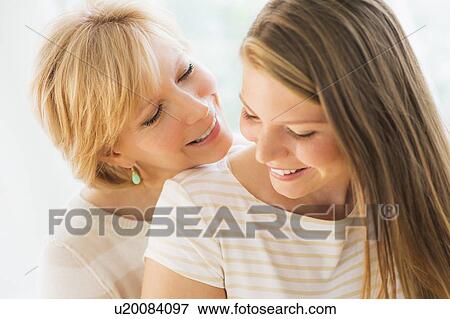 Portrait of mother and adult daughter View Large Photo Image Stock Photo - Portrait of mother and adult daughter. Fotosearch