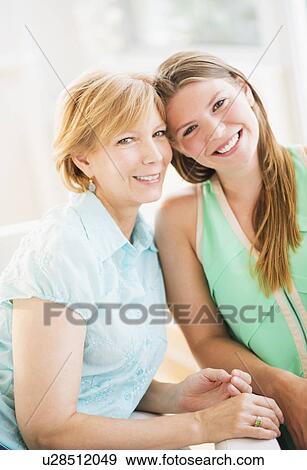 Portrait of mother and adult daughter View Large Photo Image Stock Photo - Portrait of mother and adult daughter. Fotosearch