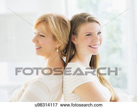 Stock Photo - Portrait of mother and adult daughter. Fotosearch