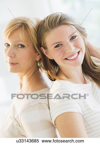 Portrait of mother and adult daughter View Large Photo Image Stock Photography - Portrait of mother and adult daughter. Fotosearch