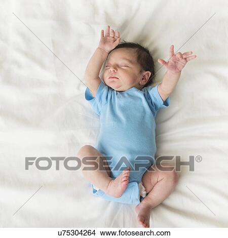 Portrait of newborn baby boy (0-1 months) sleeping View Large Photo Image Picture - Portrait of newborn baby boy (0-1 months) sleeping. Fotosearch