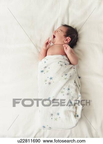 Stock Image - Portrait of newborn baby boy (0-1 months). Fotosearch