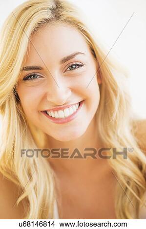 Portrait of teenage girl (16-17) smiling View Large Photo Image Picture - Portrait of teenage girl (16-17) smiling. Fotosearch