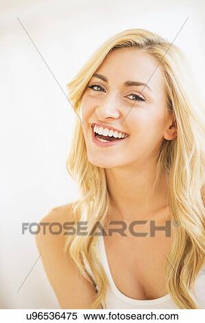 Portrait of teenage girl (16-17) smiling View Large Photo Image Stock Photography - Portrait of teenage girl (16-17) smiling. Fotosearch