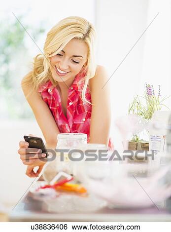 Portrait of teenage girl (16-17) using cell phone View Large Photo Image Stock Photograph - Portrait of teenage girl (16-17) using cell phone. Fotosearch