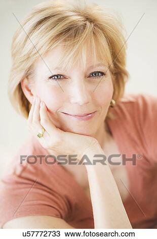 Portrait of woman smiling View Large Photo Image Stock Image - Portrait of woman smiling. Fotosearch