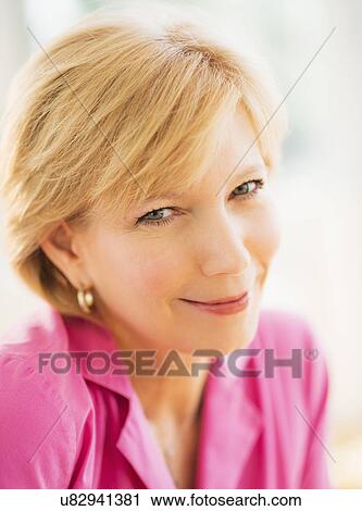 Portrait of woman smiling View Large Photo Image Stock Image - Portrait of woman smiling. Fotosearch
