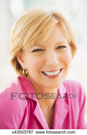 Portrait of woman smiling View Large Photo Image Stock Photo - Portrait of woman smiling. Fotosearch