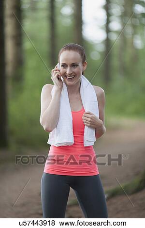 Portrait of woman talking on mobile View Large Photo Image Stock Photo - Portrait of woman talking on mobile. Fotosearch