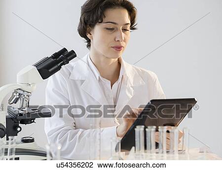 Scientist working in laboratory View Large Photo Image Stock Image - Scientist working in laboratory. Fotosearch