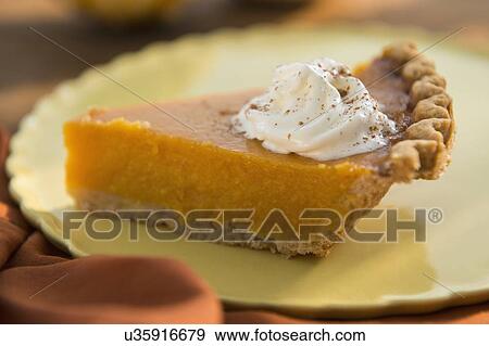 Slice of homemade pumping pie on plate View Large Photo Image Stock Photo - Slice of homemade pumping pie on plate. Fotosearch
