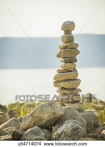 Stack of stones by lake View Large Photo Image Picture - Stack of stones by lake. Fotosearch
