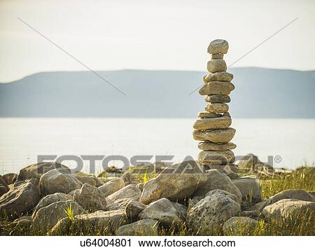 Stack of stones by lake View Large Photo Image Stock Image - Stack of stones by lake. Fotosearch