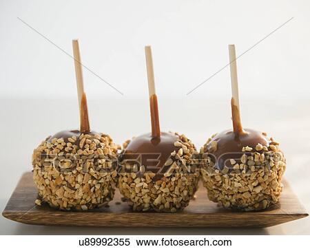 Stock Photography - Studio Shot of caramel apples. Fotosearch