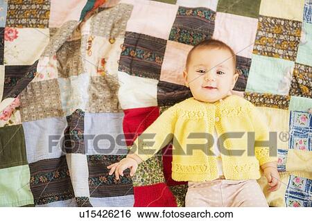 Studio Shot of smiling baby girl (2-5 months) View Large Photo Image Stock Photograph - Studio Shot of smiling baby girl (2-5 months). Fotosearch