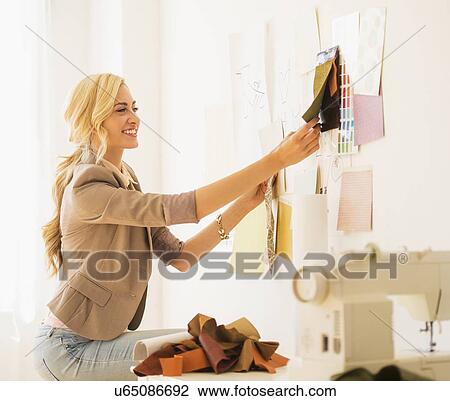 Teen (16-17) girl working in design studio View Large Photo Image Stock Image - Teen (16-17) girl working in design studio. Fotosearch