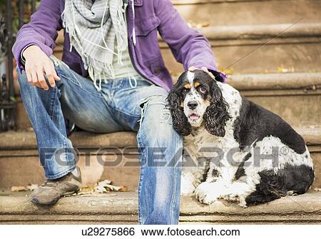 Teenage boy(16-17) with dog View Large Photo Image Stock Photograph - Teenage boy(16-17) with dog. Fotosearch