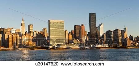 View of skyline at sunset View Large Photo Image Stock Image - View of skyline at sunset. Fotosearch