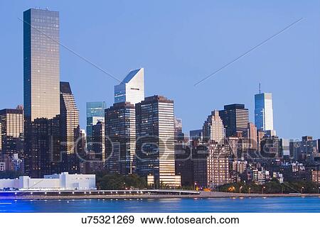 View of skyline at sunset View Large Photo Image Stock Photo - View of skyline at sunset. Fotosearch