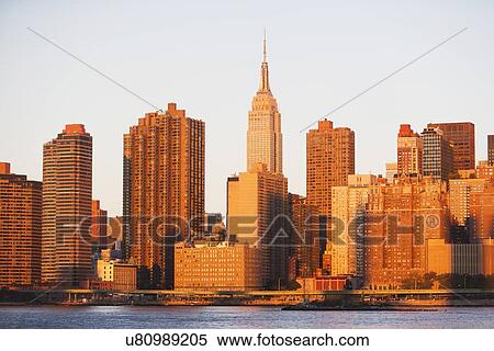 View of skyline at sunset View Large Photo Image Stock Photography - View of skyline at sunset. Fotosearch