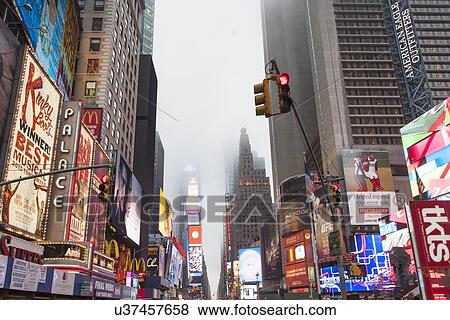 Stock Photo - View of Time Square at dusk. Fotosearch