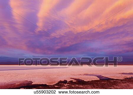 Stock Image - View to Laguna Tebinquiche at sunrise. Fotosearch