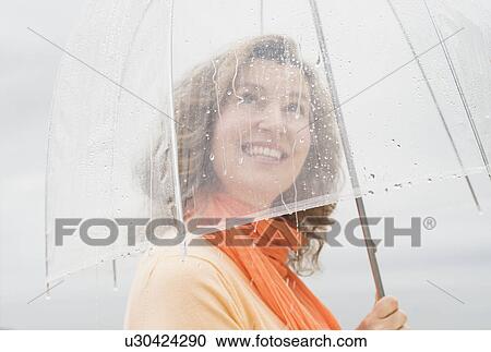 Woman with umbrella View Large Photo Image Stock Image - Woman with umbrella. Fotosearch