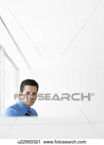 Businessman in office portrait View Large Photo Image Stock Image - Businessman in office portrait. Fotosearch