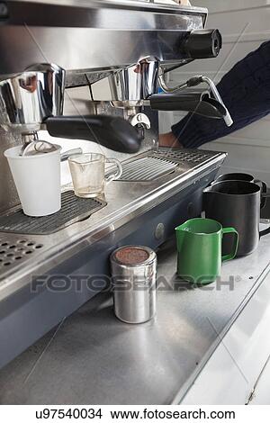 Close-up of coffee machine View Large Photo Image Picture - Close-up of coffee machine. Fotosearch